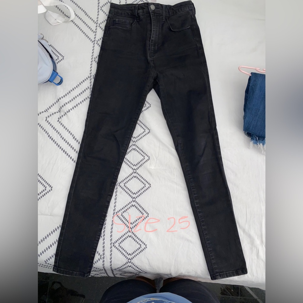 Very high rise. Size 25. Stretchy. A bit faded